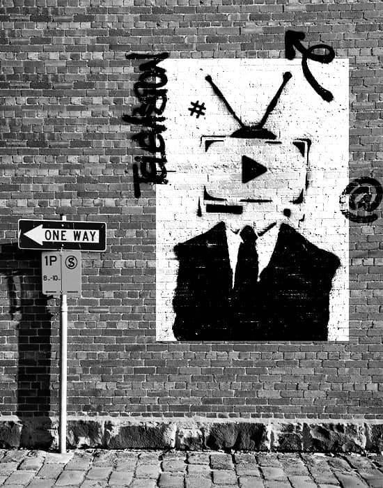 Graffiti art of man with TV head
