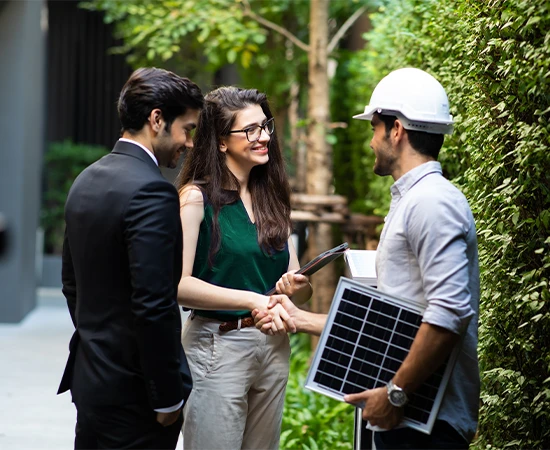 Solar Electrician Shaking hands with business people